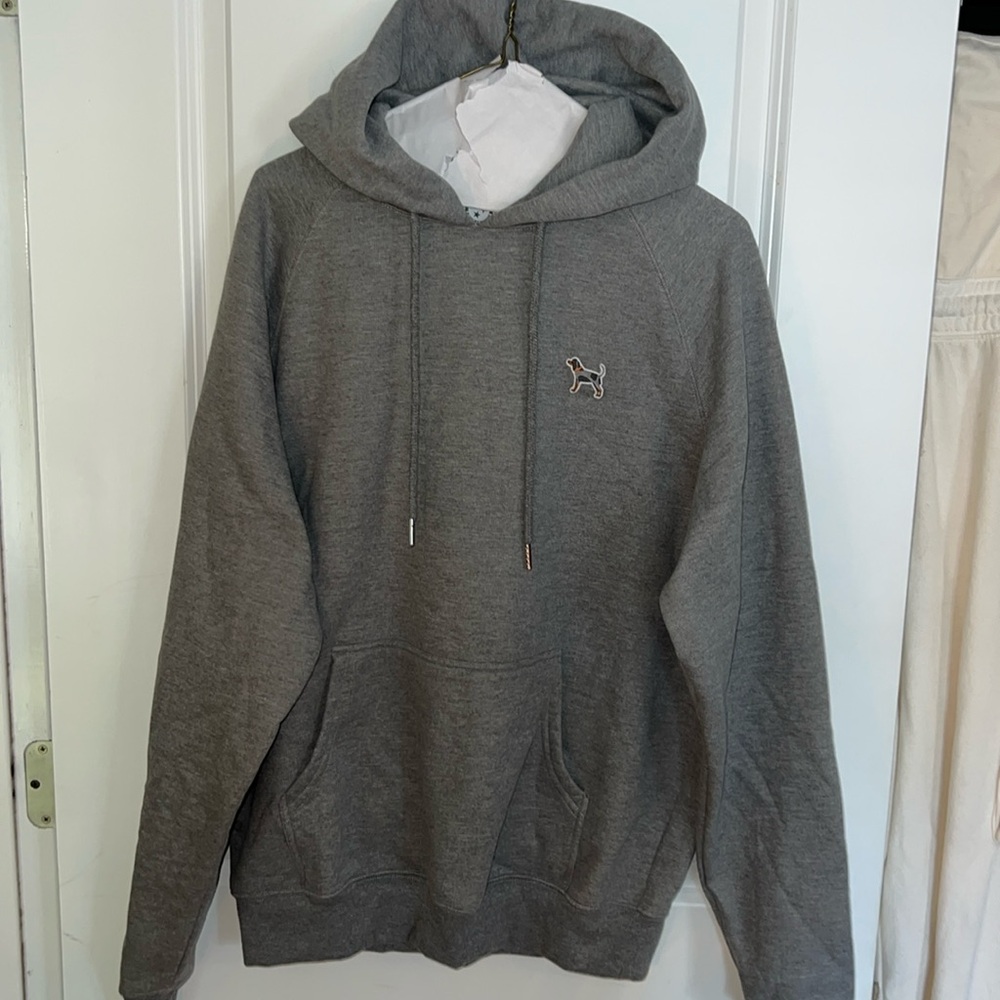 Gray Tennessee Volunteer sweatshirt with Smokey embroidered patch.